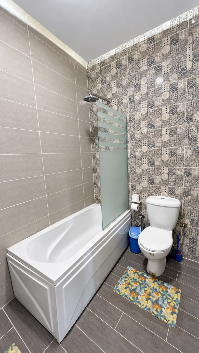 Bathroom with bathtub and shower