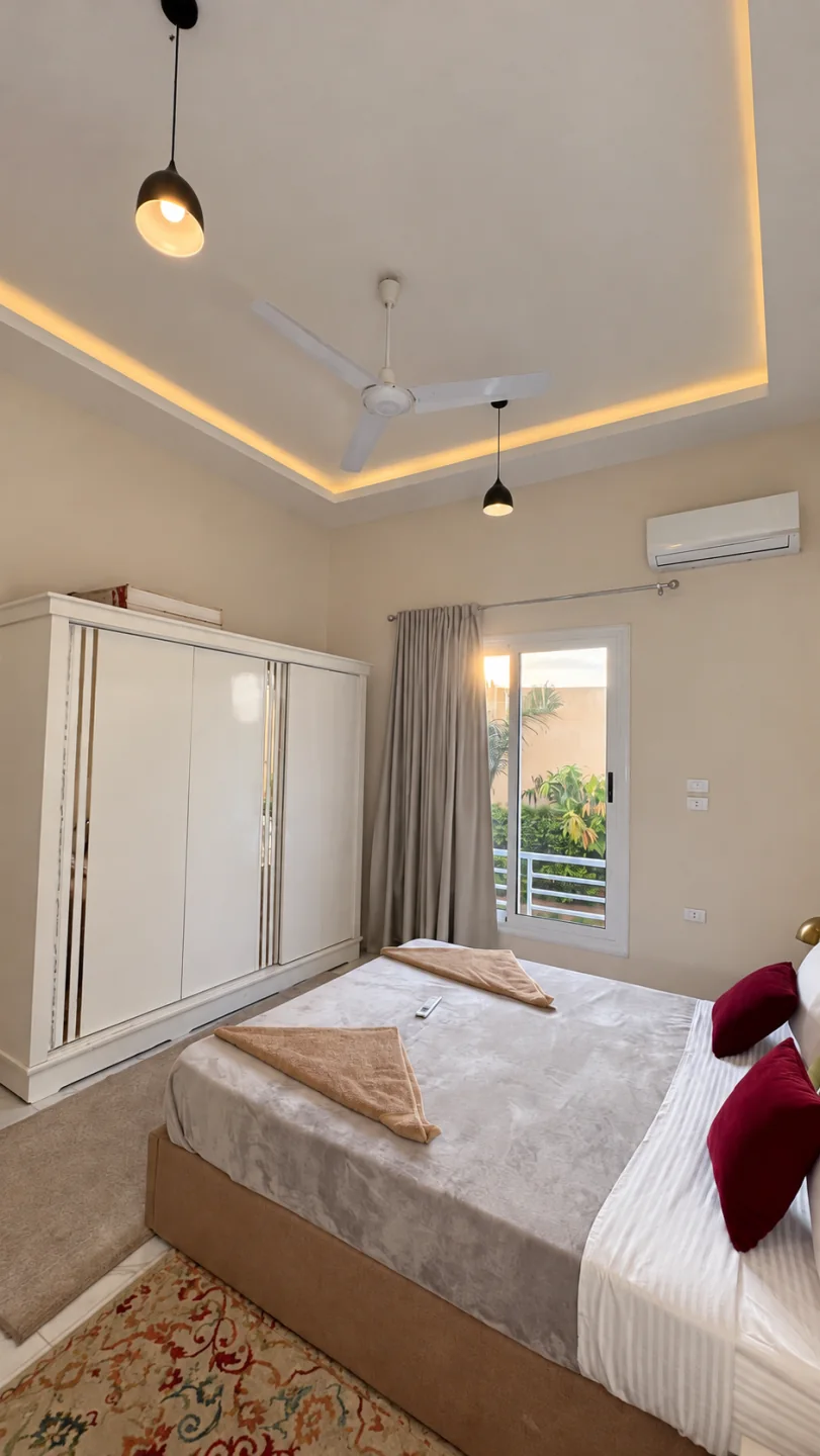 Queen bedroom in the afternoon light