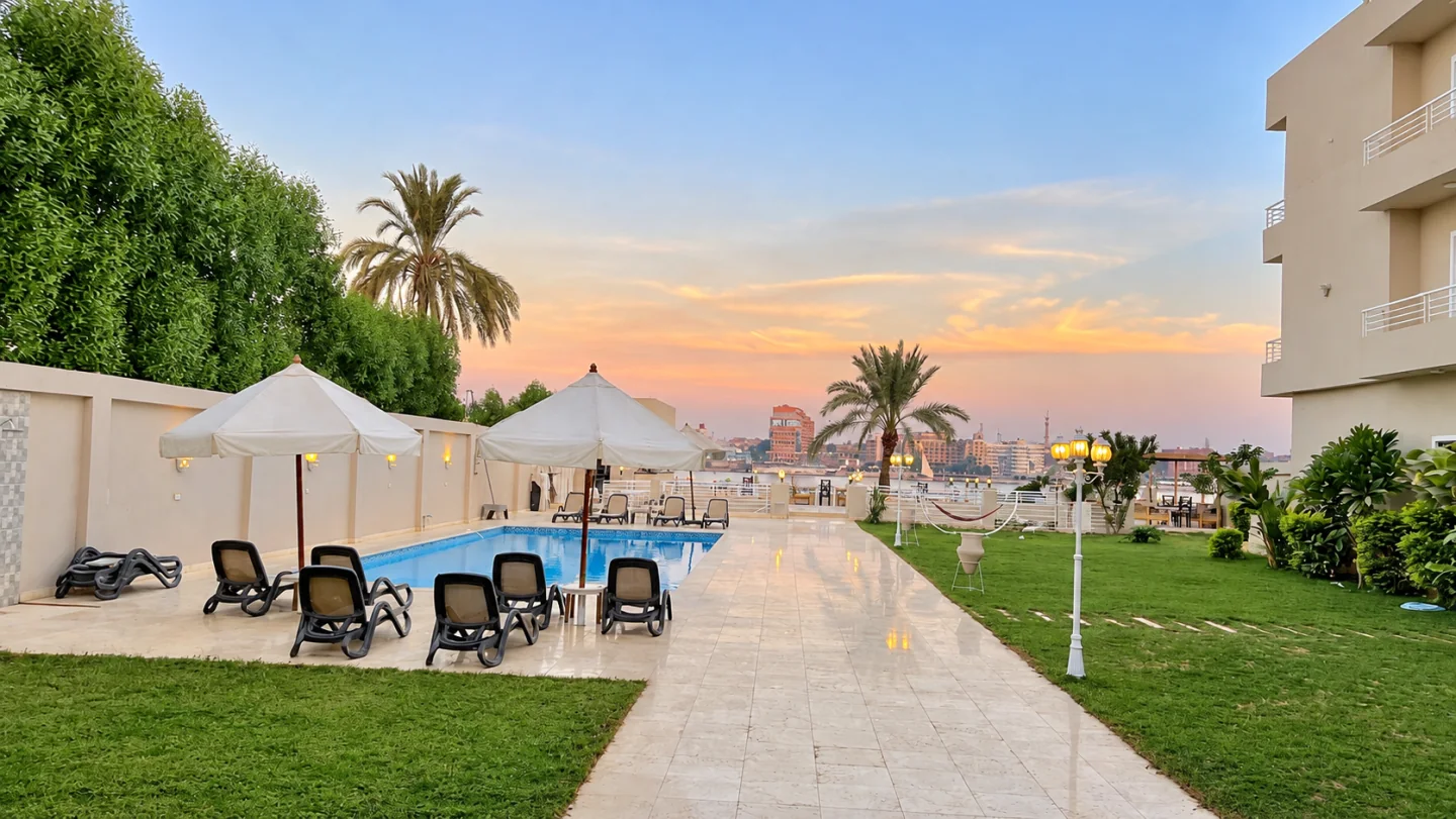 Shared pool and garden at sunset