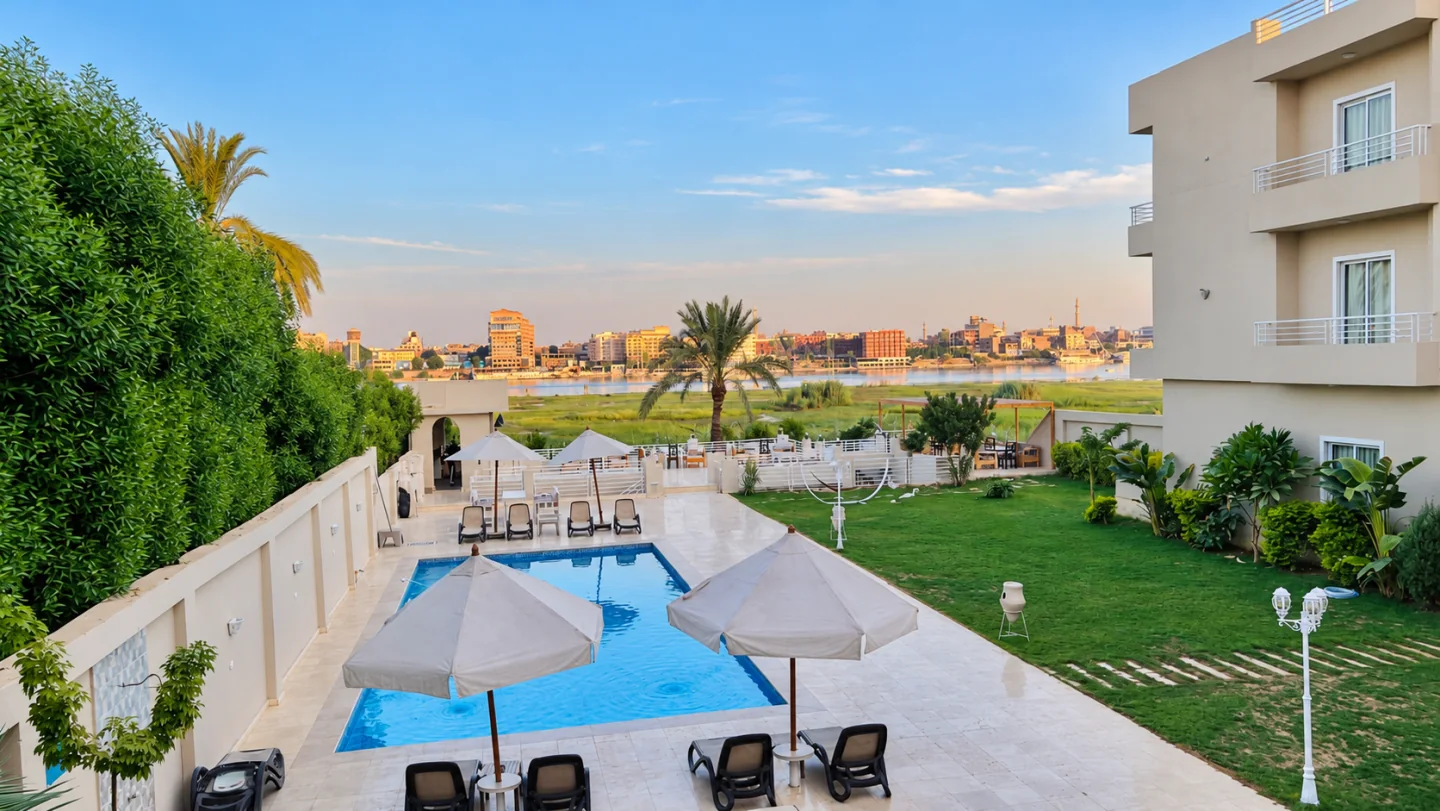 Shared pool, garden and Nile view from the restaurant