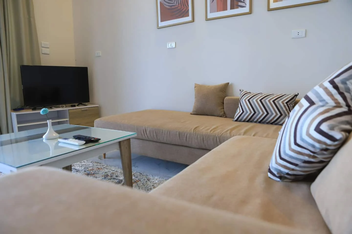 Sofa and television in Nile View Apartment 1