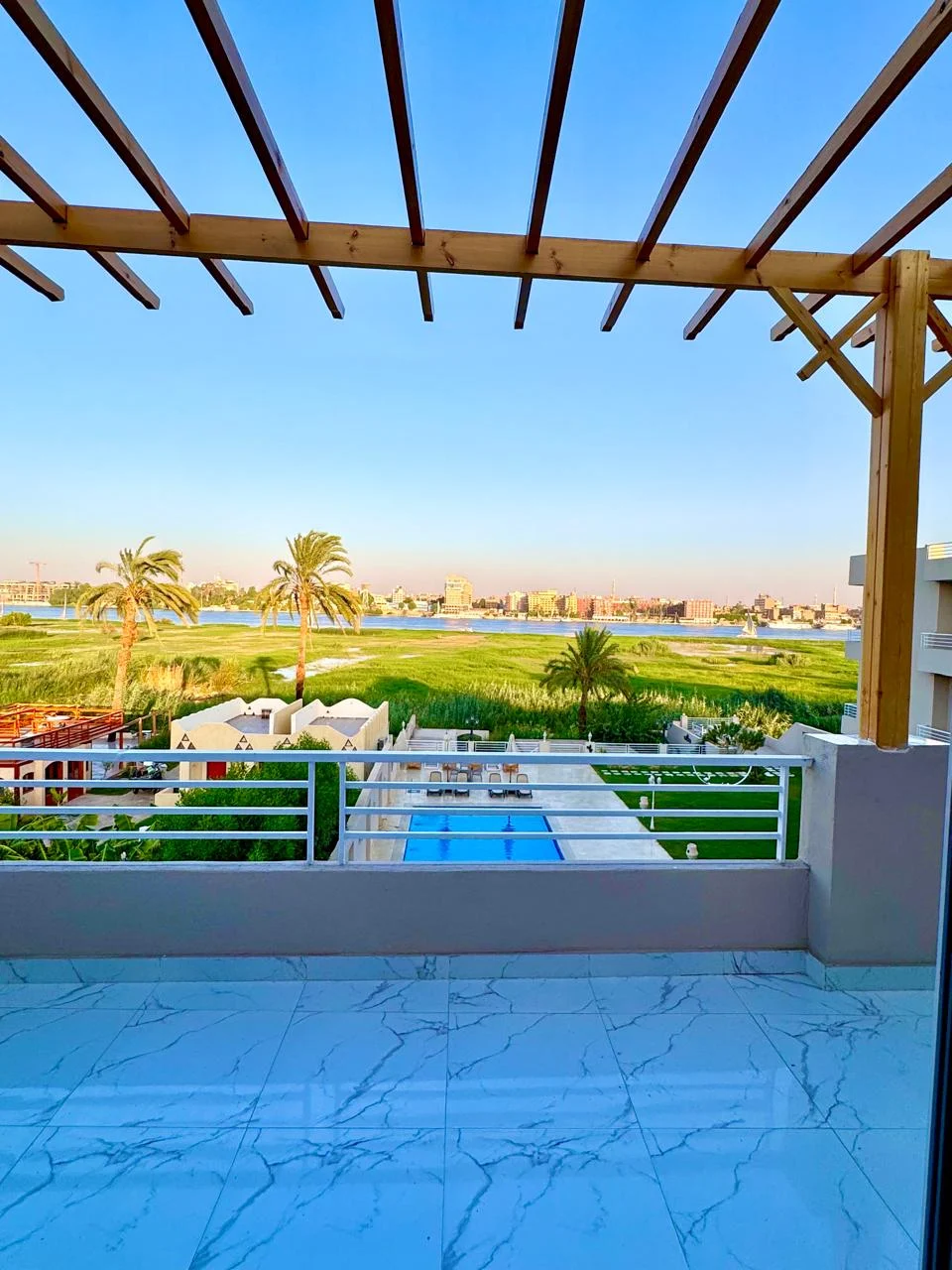 Nile and pool view from a Royal Nile Villas Sky Penthouse terrace