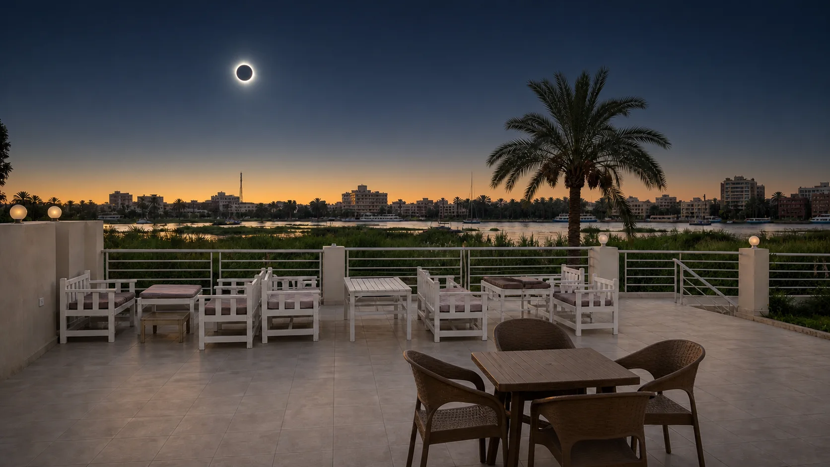 Total solar eclipse above the panoramic Royal Nile Villas terrace